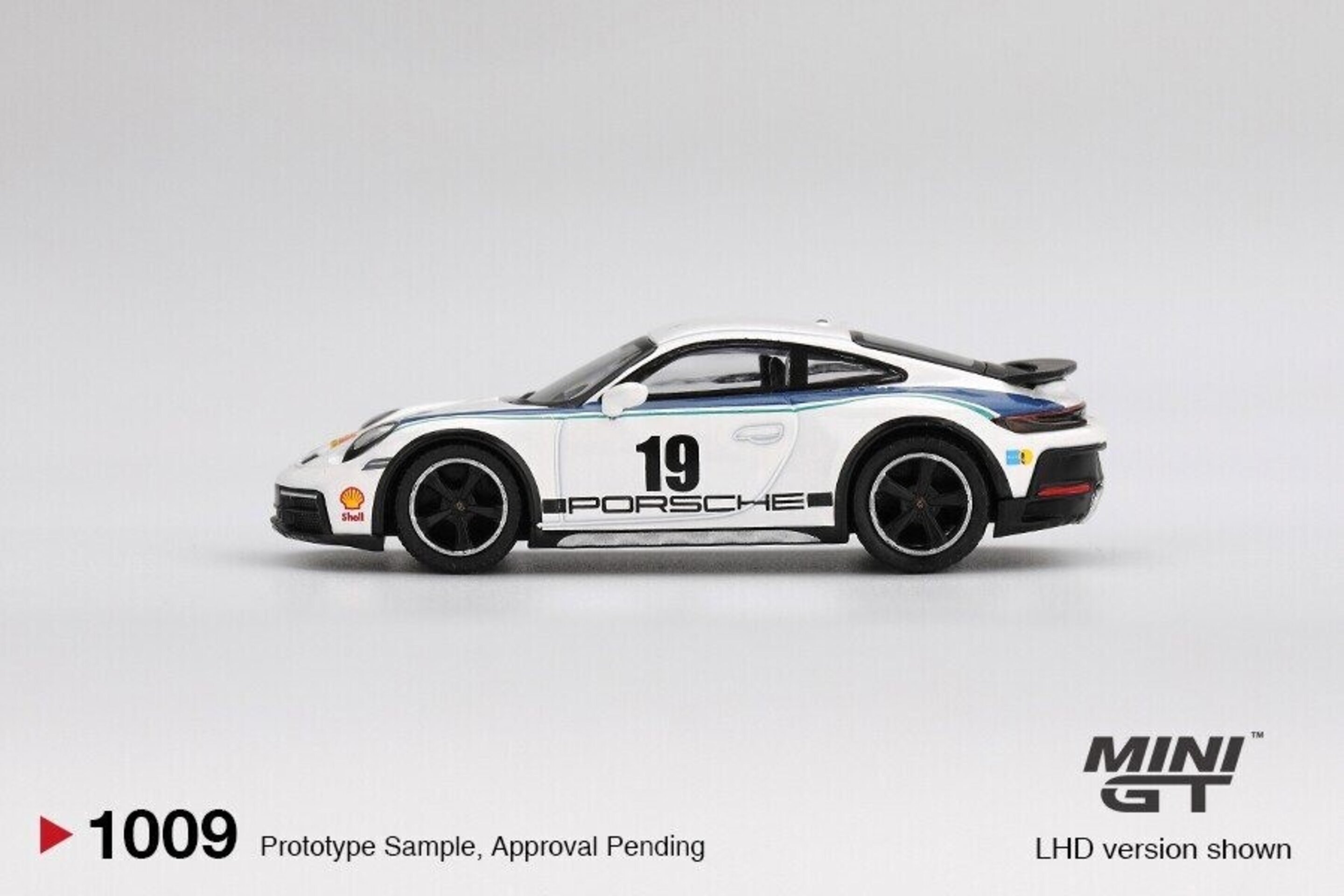 MGT01009-L 1:64 PORSCHE 911 (992) DAKAR RALLYE DESIGN PACKAGE 74 2024 - 2